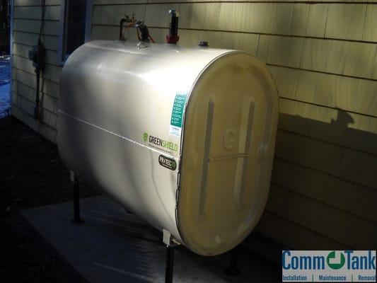 Granby heating oil tank installed outside on a cement pad.