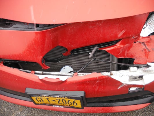 Toyota Prius Vs. back bumper of a pick up truck.