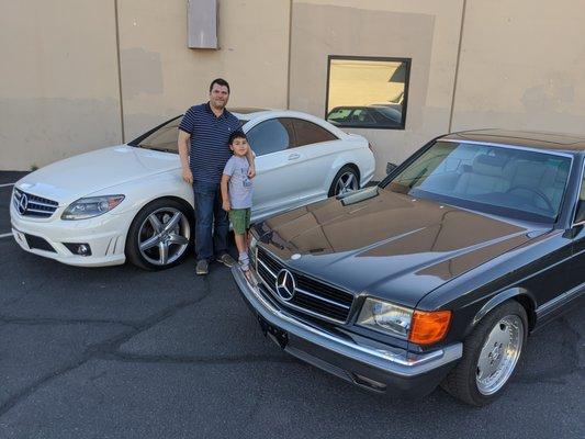 Me and my son by our new car (2009 CL63) and the old car I restored and traded in (1991 560SEC)