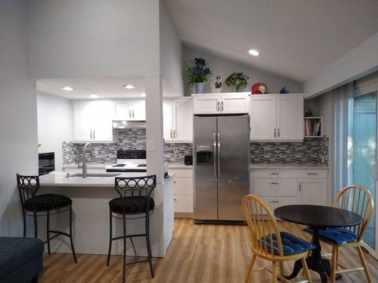 I took out all the cabinets and countertops. Cabinets Unlimited installed this beautiful kitchen.