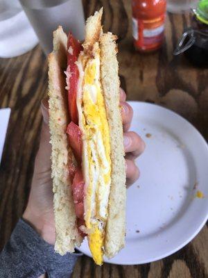 Egg, cheese, and heirloom tomato