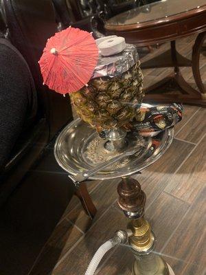 Pineapple head hookah. Get the Torch blend.