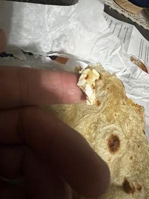 egg shell inside breakfast burrito