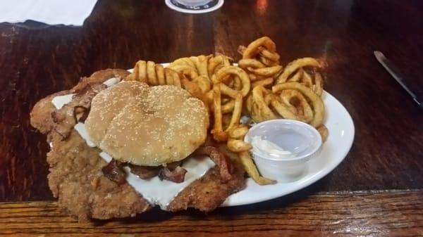 Awesome pork tenderloin with bacon.  Curly fries are more than enough!