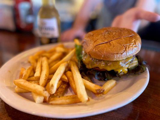 Cheeseburger and fries looking tasty at Jim & Rob's Fresh Grill. The menu holds 6 different kinds of burgers to explore!