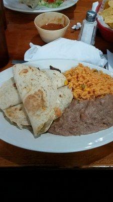 Large cheese quesadilla with rice and beans