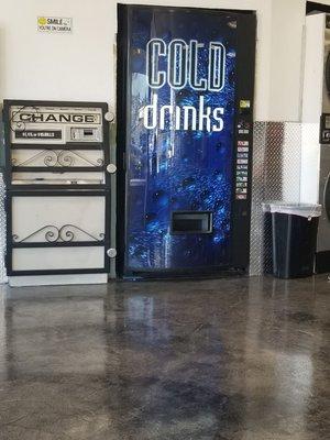 Change machine and soda machine near the front entrance.