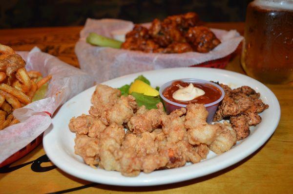 Get your taste buds ready for a wild adventure with our Fried Gator Platter, served with a zesty squeeze of lemon!