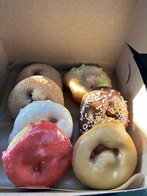 from back left to front: cinnamon sugar, vanilla bean, raspberry, maple, chocolate sprinkles, pineapple