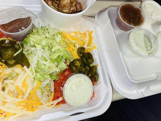 Taco salad w/chicken! Very moist. Loaded sides & dips