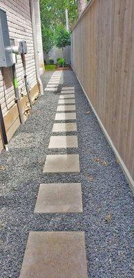 Walkway towards pool into the backyard