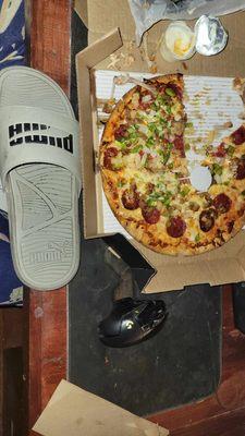 Sandal is 12 inch. Pizza is 10 inch.