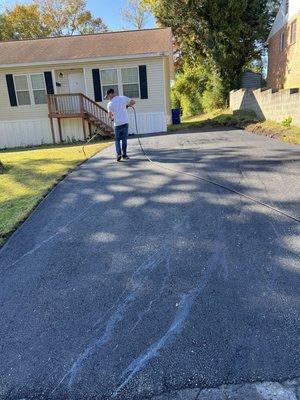 Sealing the new driveway! Isn't it beautiful!!!