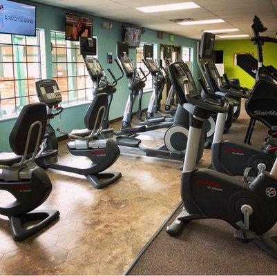 Cardio equipment with new Tv's and app installed to stream audio to your device.