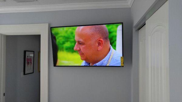 55 Inch Smart TV on a fully adjustable wall mount