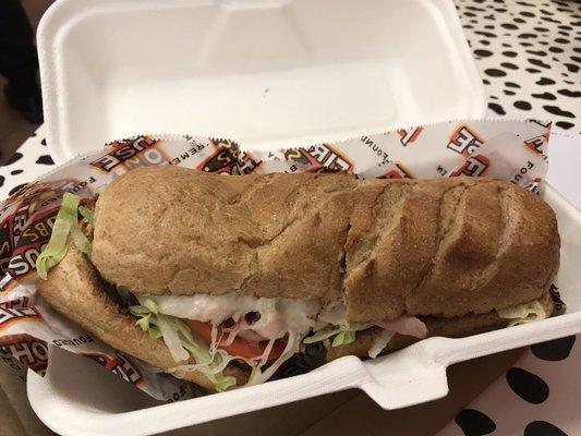 Firehouse Hero (turkey, roast beef, ham) medium sub on wheat