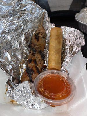 That's a chicken on a stick n a pork lumpia, absolutely delish!!