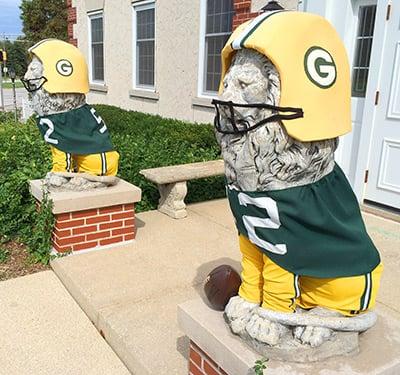 An iconic landmark in Greenfield, The Starr Group Lions dress for the seasons. Here they support the Green Bay Packers!