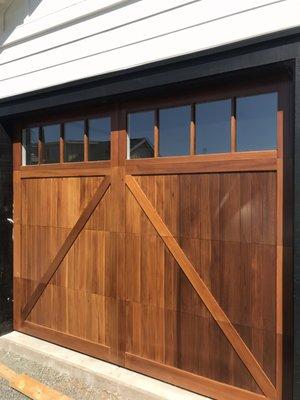 Chi- steel carriage cedar trim. Madison windows.