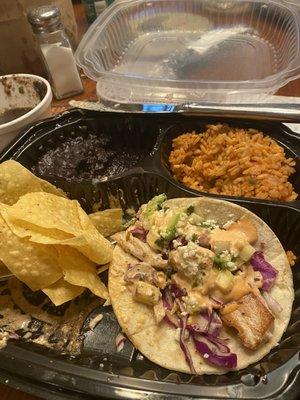 To Go Leftovers for 2nd lunch - Mahi tacos, crispy thin chips, black beans & seasoned rice.