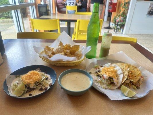 Steak soft taco supreme and beef taco's supreme on hard fried shells with chips and cheese