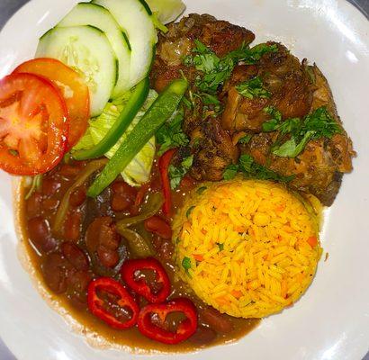 Stew Chicken, Vegetable Rice, Red Beans, and Fresh Salad