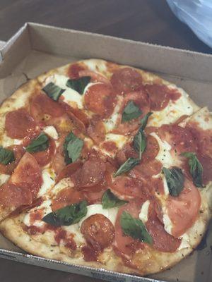 Different angle so you can see tomatoes on Margherita Pizza