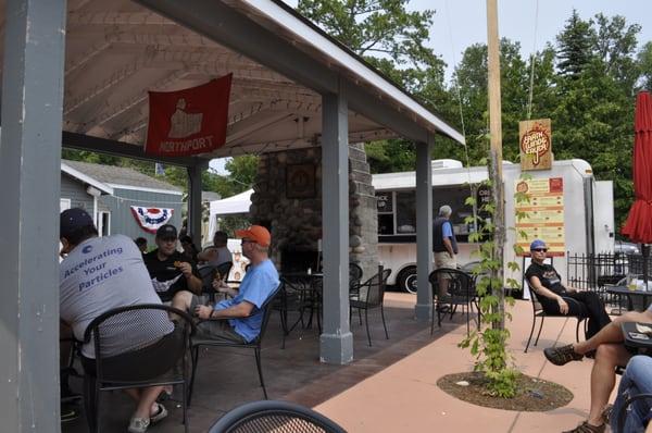 Outdoor fireplace and food truck