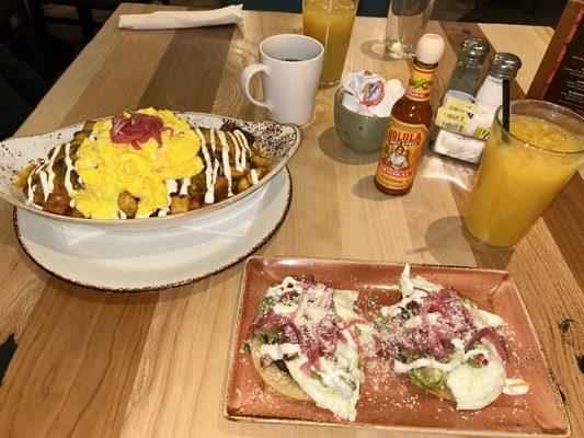 Loaded breakfast potato with egg cheese meat and cauliflower taco and albongia taco