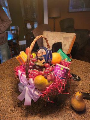 This is the basket I received. The grass was actually red. This is not primarily fruit. This looks like an Easter basket! Not for a funeral.