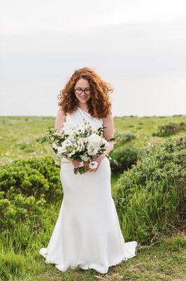 They knew exactly how much to hem/take in while still keeping it flowing and comfortable! Photo by Zoe Larkin Flowers by Poppy Cart