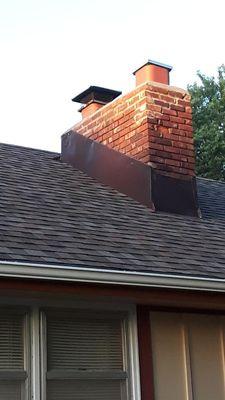 Repaired flashing on chimney.