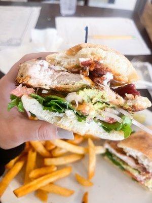 Club sandwich with mayonnaise, bacon, chicken avocado, onion, tomato lettuce- all so fresh!!!