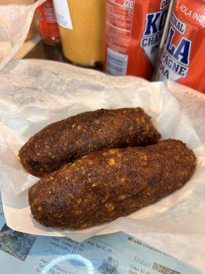 Alcapurrias de Guineo con carne de cerdo (Fried banana stuffed with pork.)