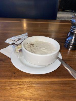 Trying the clam chowder while in Seattle