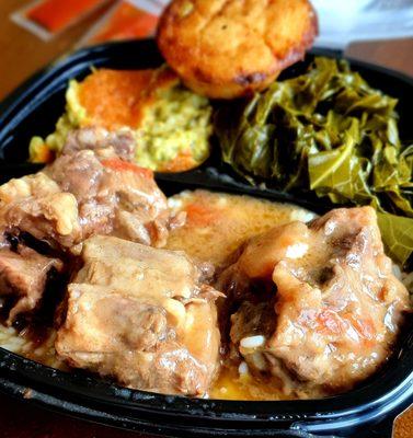 Braised Oxtail over rice with gravy, broccoli casserole, collards, and a jalapeno corn muffin, $19.95. Mmmmm.