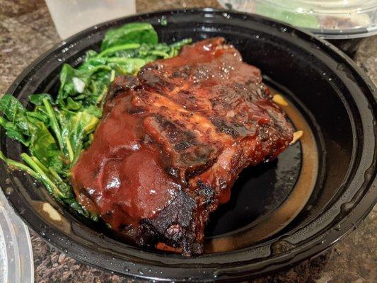 Costillas Matanzas: BBQ ribs with spinach. Mashed potatoes on the side (not shown).