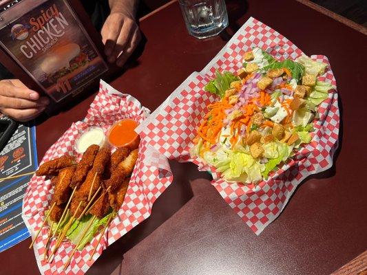 Chicken skewers and side salad