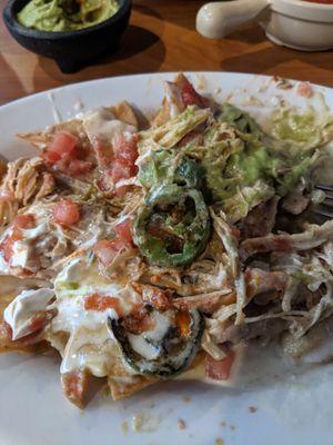 Shredded chicken nachos, added jalapeno, no lettuce