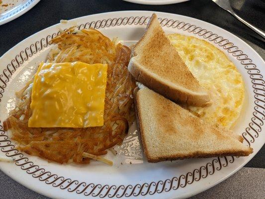 Eggs over medium and hash browns with cheese at the Waffle House