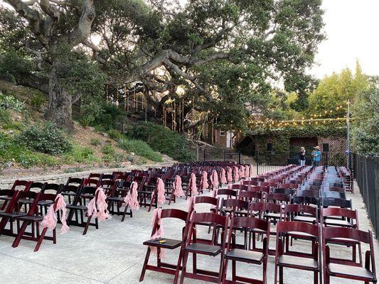 Ceremony area- they had to come down that hill and stairs with this many chairs.