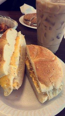 Egg and cheese on a roll with a Medium Ice Coffee with cream and sugar!