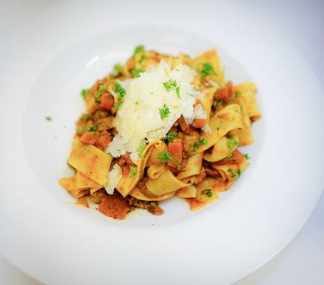 Slow-simmered Bolognese over Pappardelle