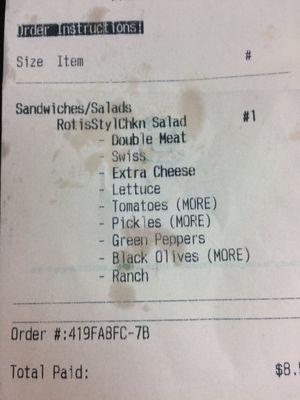 Receipt stating double meat, extra cheese, and more tomatoes