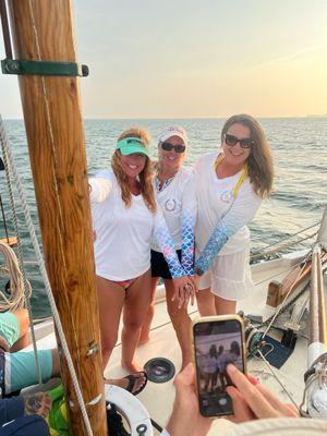 The ladies sporting team colors on the birthday sail