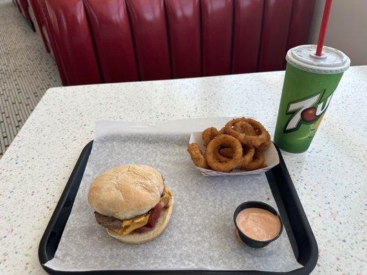 Bacon Cheeseburger with onion rings and medium drink.