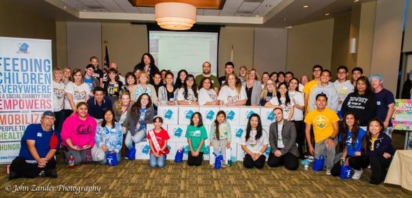 (4/2014) Team 1 with their packed half of the 27,000 meals.