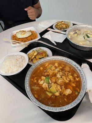 Soft tofu soup, rice cake and dumplings, and kimchi fried rice