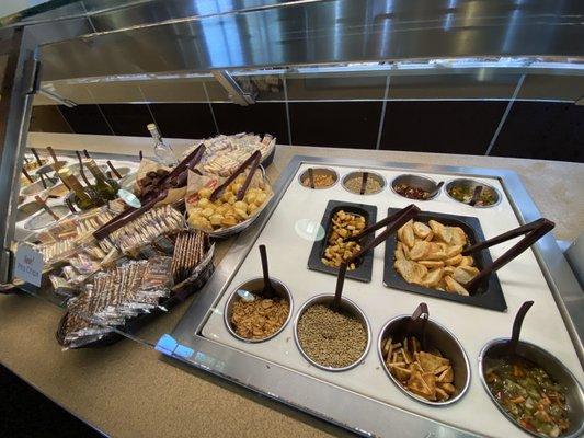 Inviting salad bar, with fresh ingredients & nice presentation