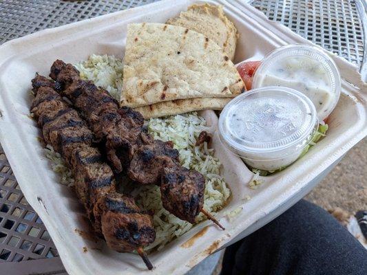 Beef Platter with rice, salad, and hummus.